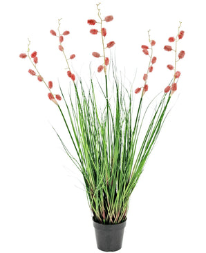 De Kunst Grasplant Duizendpootgras 100 cm brandvertragend is een zwarte kunstplant in pot met hoge, dunne groene bladeren en lange stelen met trossen kleine, ovale roze-rode bloemen in een rechtopstaande, spreidende display.